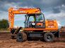 Вид 3: DOOSAN DX160W колесный экскаватор