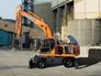 Вид 1: DOOSAN DX210W колесный экскаватор