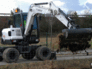 Вид 2: Bobcat Е55W мини экскаватор